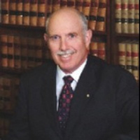T. Charles T. Lawyer
